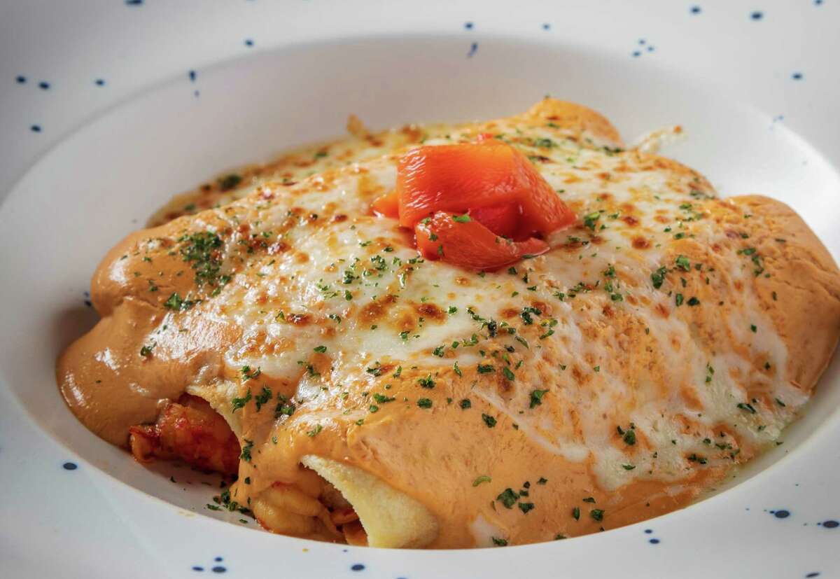 Arnaldo Richards' Picos restaurant marks crawfish season with crawfish enchiladas: fresh corn tortillas filled with sautéed crawfish and smothered in creamy chipotle sauce and Chihuahua cheese.