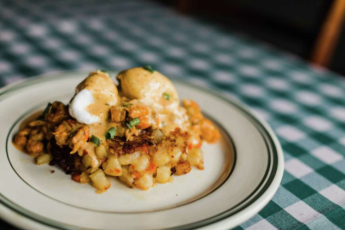BB Lemon's weekend brunch includes potato and crawfish hash topped with poached eggs and blackened Hollandaise sauce.