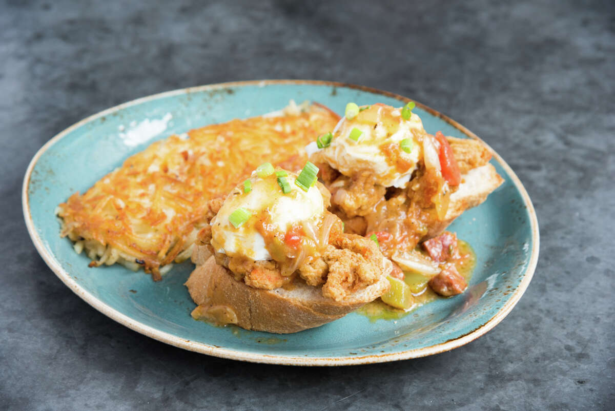 State Fare Kitchen & Bar's weekend brunch menu includes Crawfish & Creole Benedict: fried crayfish tails and poached eggs on etoufée-covered French bread.