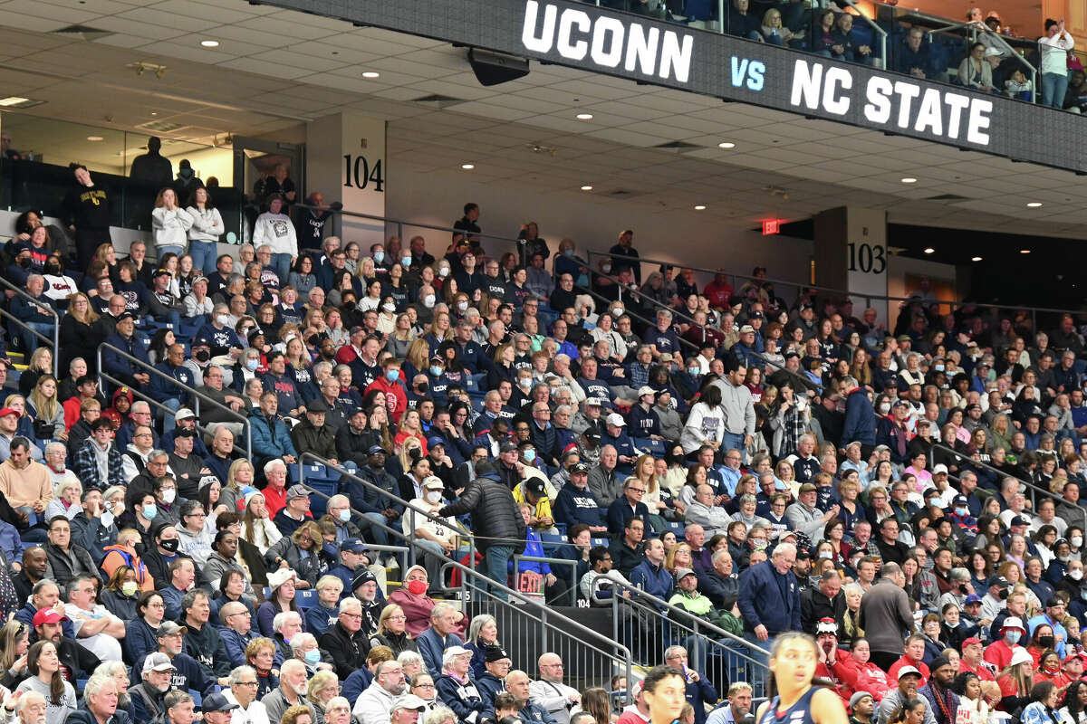 Fans gathered to watch as the UConn women’s basketball team played North Carolina State University Wolfpack in the Elite Eight tournament on Monday, March 28, 2022. 