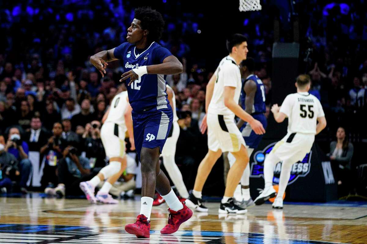 Saint Peter's Clarence Rupert reacts during the first half of a college basketball game against Purdue in the Sweet 16 round of the NCAA tournament, Friday, March 25, 2022, in Philadelphia.