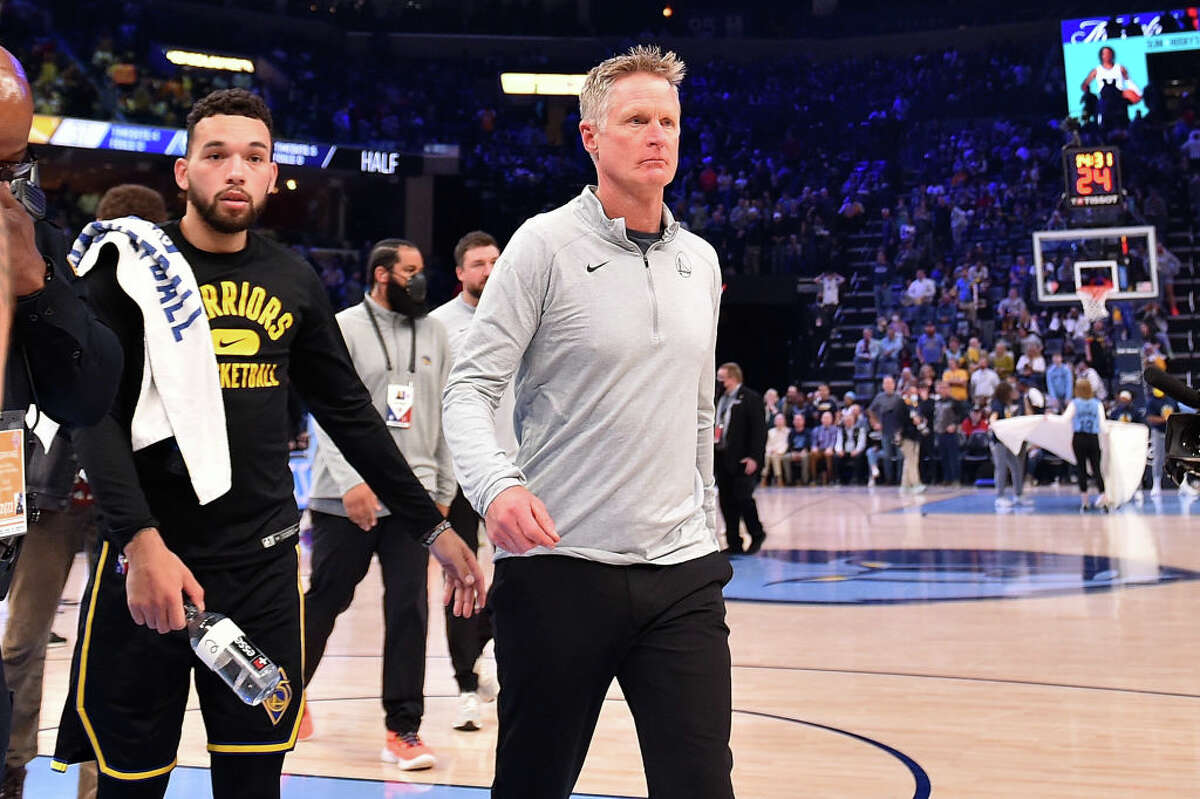 Golden State Warriors coach Steve Kerr walks off the court after being ejected during the first half against the Memphis Grizzlies at FedExForum on March 28, 2022 in Memphis, Tennessee.