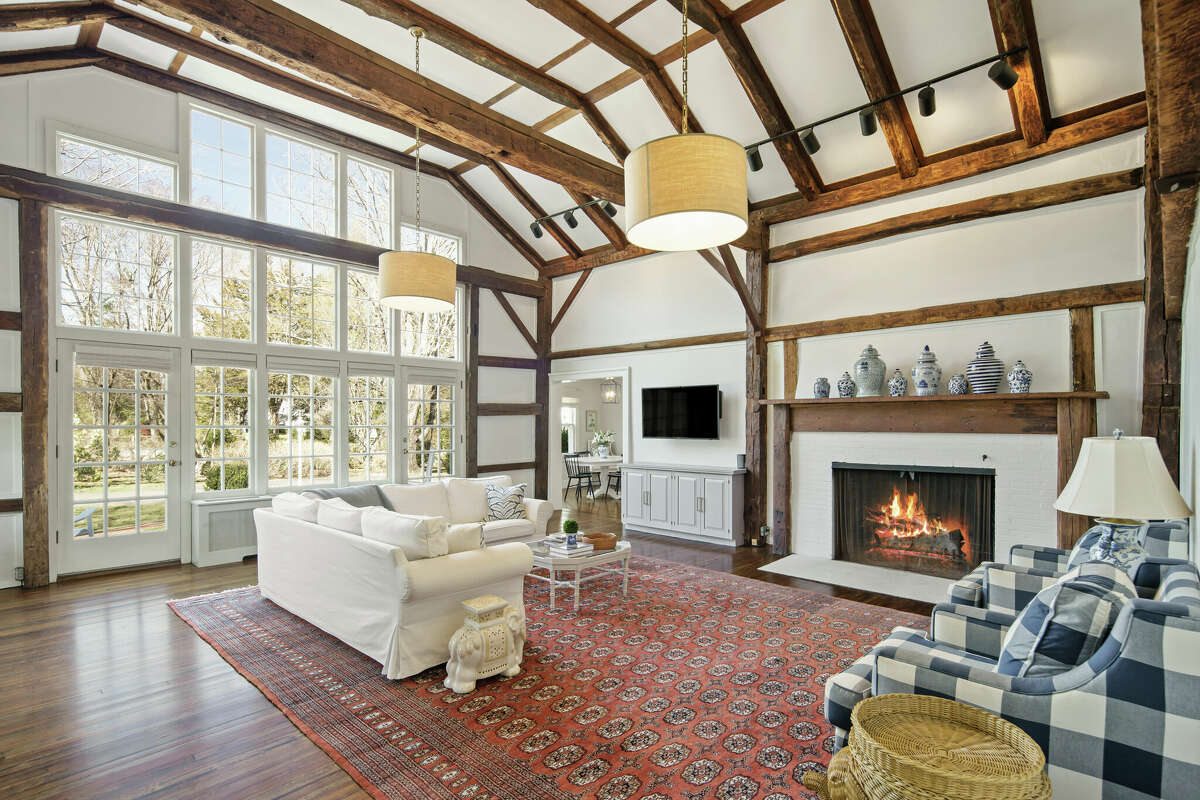 The living room in the home on 990 Silvermine Road in New Canaan was converted from an 1800s barn. 