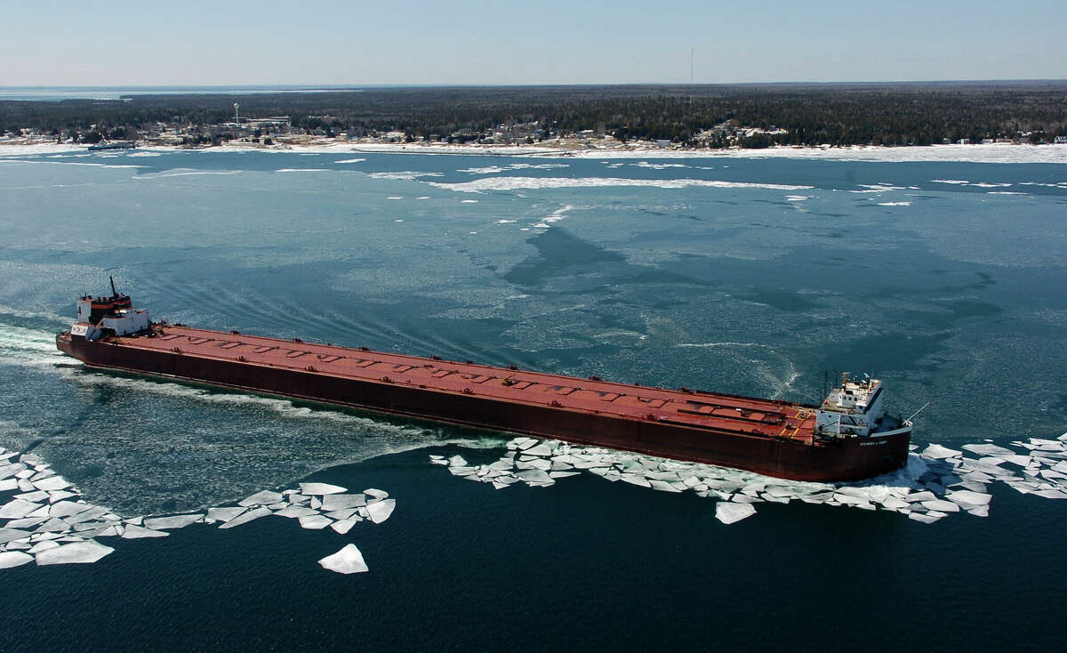 The 1,000-foot freighter Stewart J. Cort moves up the St. Mary's River past the village of Detour,  March 25, 2011, after the Soo Locks opened for the 2011 shipping season.The U.S. Army Corps of Engineers estimates that shipping in Manistee supports $327.9 million in business revenue and nearly 2,000 jobs.