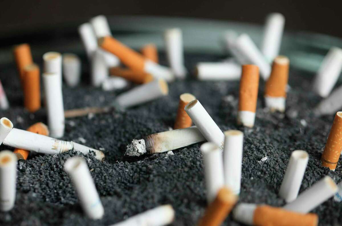 Cigarette butts in an ashtray.