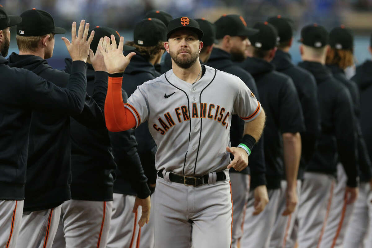 Evan Longoria of the San Francisco Giants is introduced before Game 3 of the NLDS.