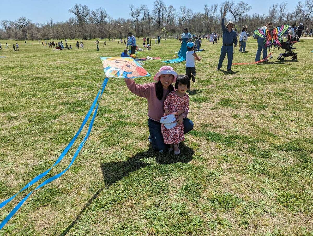 Anh Pham with her three-year-old daughter at the kite festival.