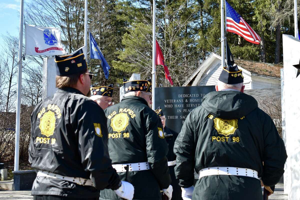 During a Vietnam Memorial Day service, the Big Rapids Honor Guard performed a rifle firing, said a prayer for fallen soldiers, stood at attention for the playing of taps, and shared the blank casings with several of those in attendance. 