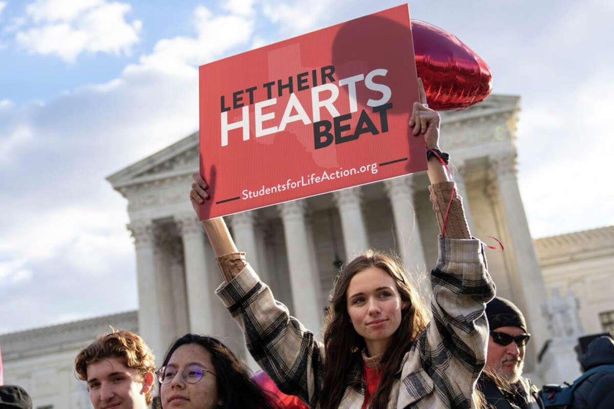 Anti-abortion demonstrators rally outside the U.S. Supreme Court on Nov. 1, 2021 in Washington, DC. On Monday, the Supreme Court is hearing arguments in a challenge to the controversial Texas abortion law which bans abortions after 6 weeks. (Drew Angerer/Getty Images/TNS)