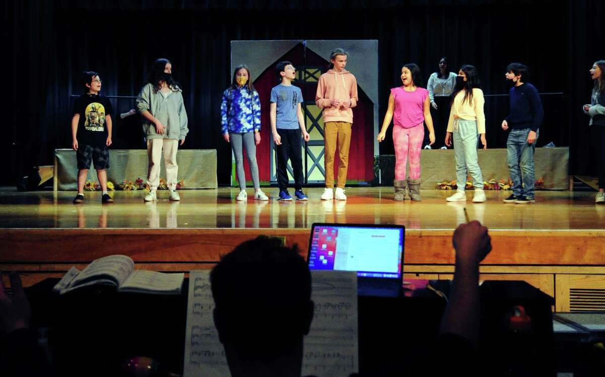 Western Middle School students rehearse for the musical "Honk! Jr" at the school in Greenwich, Conn., on Tuesday March 22, 2022. "Honk! Jr" is a musical based on "The Ugly Duckling" and made for young performers.