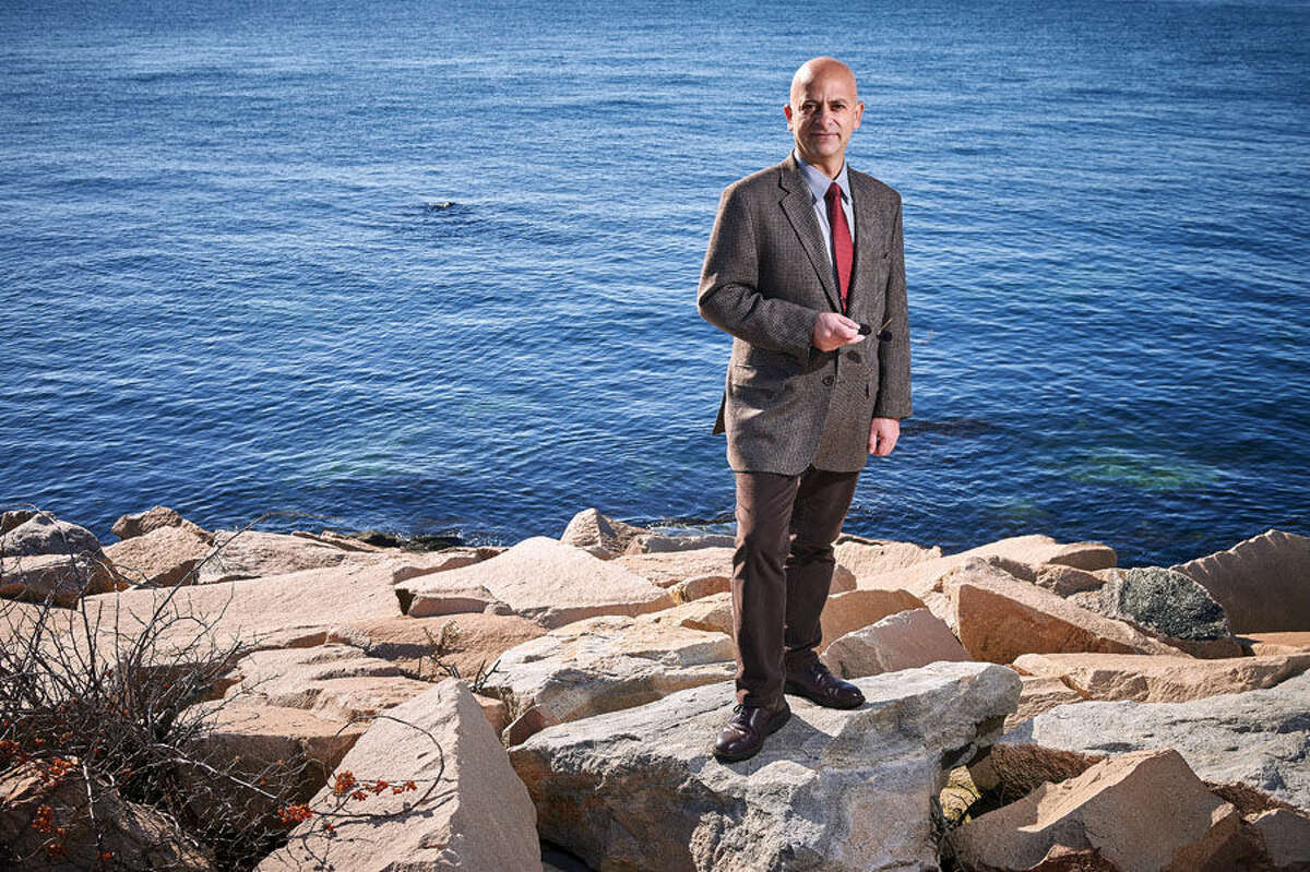 Kroum Batchvarov, assistant professor of anthropology, stands near Long Island Sound at the Avery Point campus on Nov. 18, 2016. 