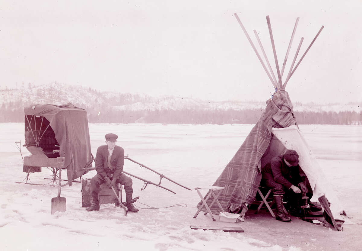 Ray Edwards and Frank Lyberry ice fishing on Herring Lake in1907.