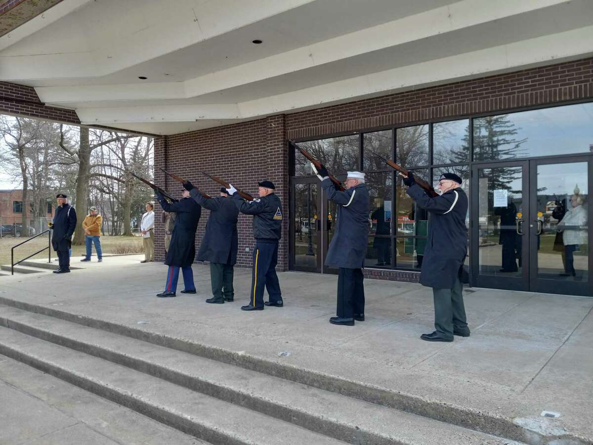 Torrington's Veterans Memorial Committee held a ceremony for National Vietnam Veterans Day, Tuesday at the Coe Memorial Park Civic Center. The Honor Guard fires their rifles outside the center during the ceremony.