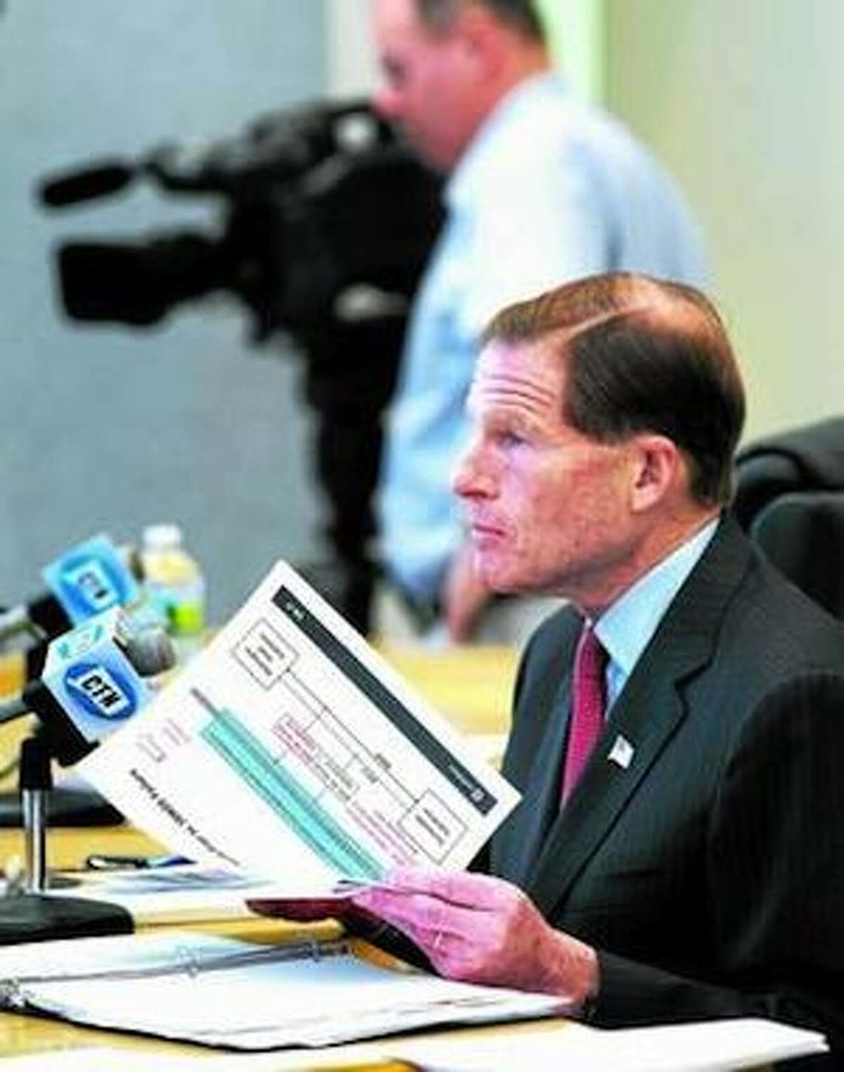 U.S. Senator Richard Blumenthal chairs a Senate committee hearing concerning the recent power outage to Metro-North trains at Bridgeport City Hall on 10/28/2013.