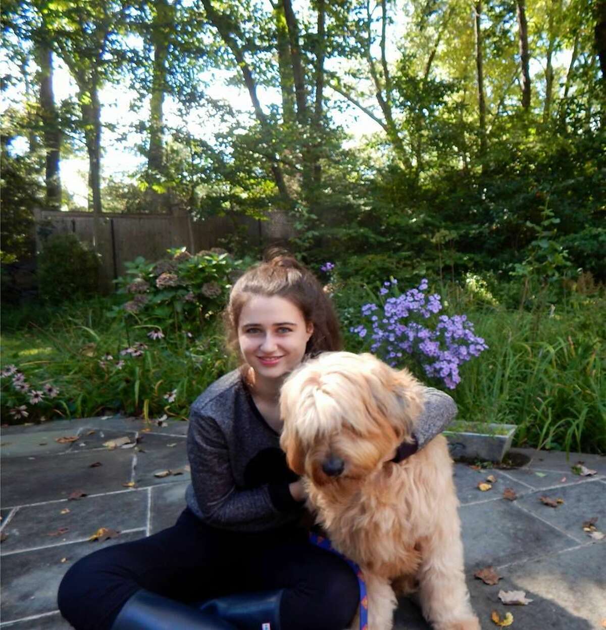 Annie Blumenfeld with Teddy, in a photo from the Wags 4 Hope Facebook page.