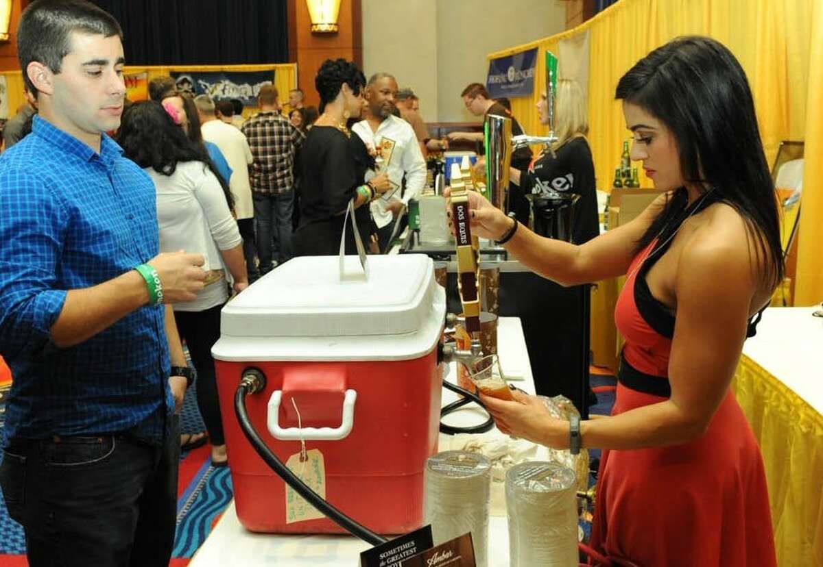 Beer is served at last year's Sun BrewFest. The festival will return to Mohegan Sun Saturday Oct. 4.