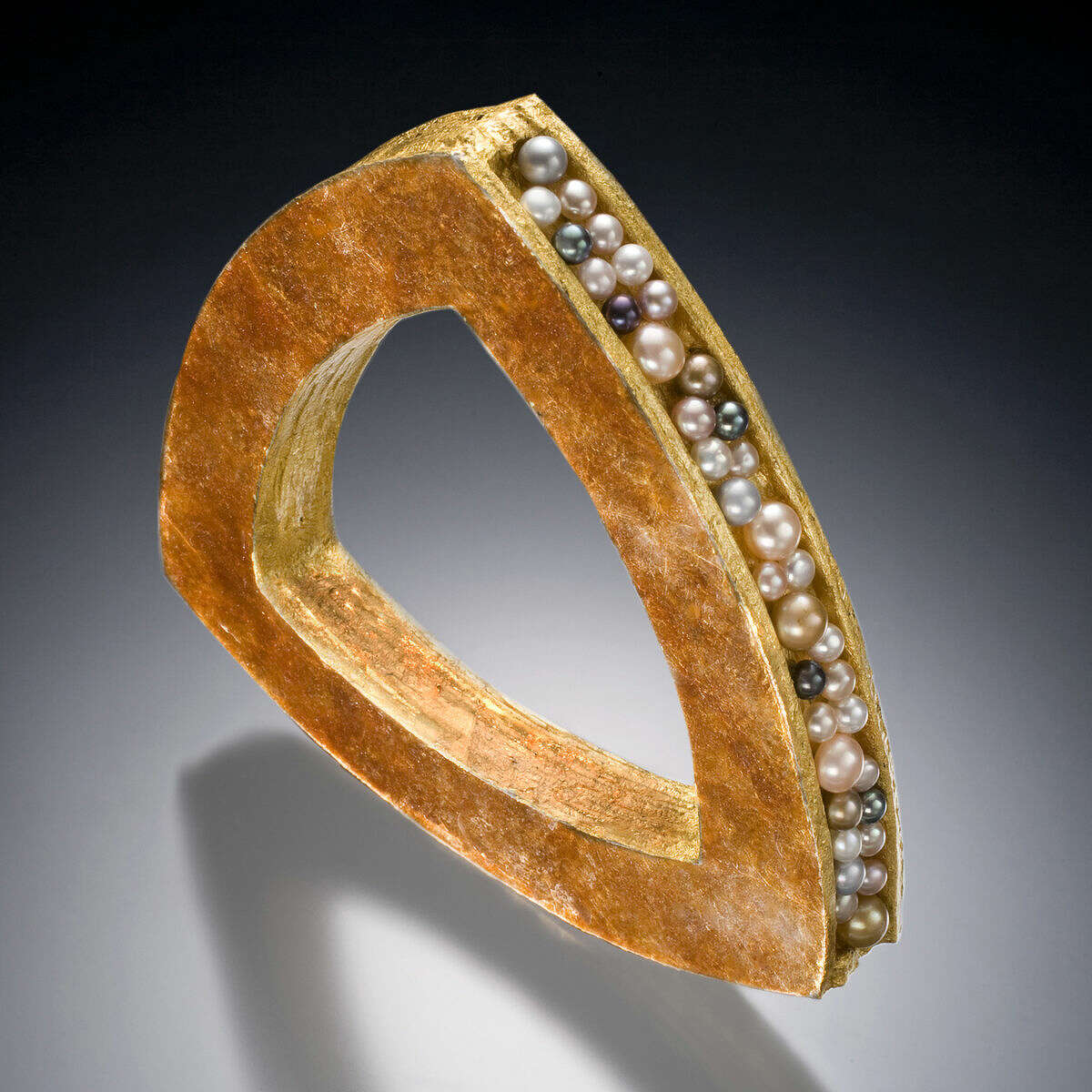 A bangle bracelet by fine jewelry designer Keith Lewis.