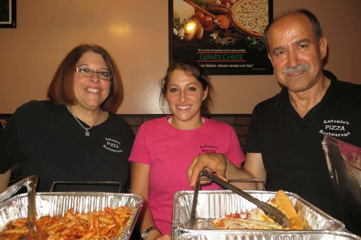 Employees from Antonio's Pizza Restaurant at last year's Taste of Manchester.
