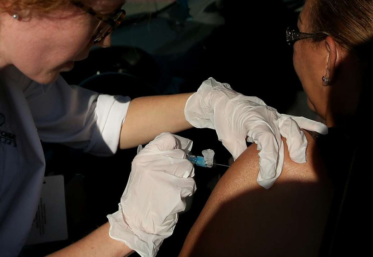 A flu shot being administered in California.