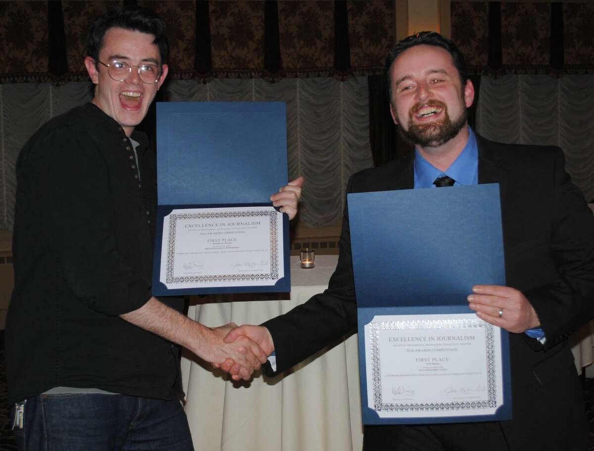 Connecticut Magazine writers Michael Lee-Murphy, left, and Erik Ofgang picked up awards at the annual Connecticut SPJ awards ceremony.