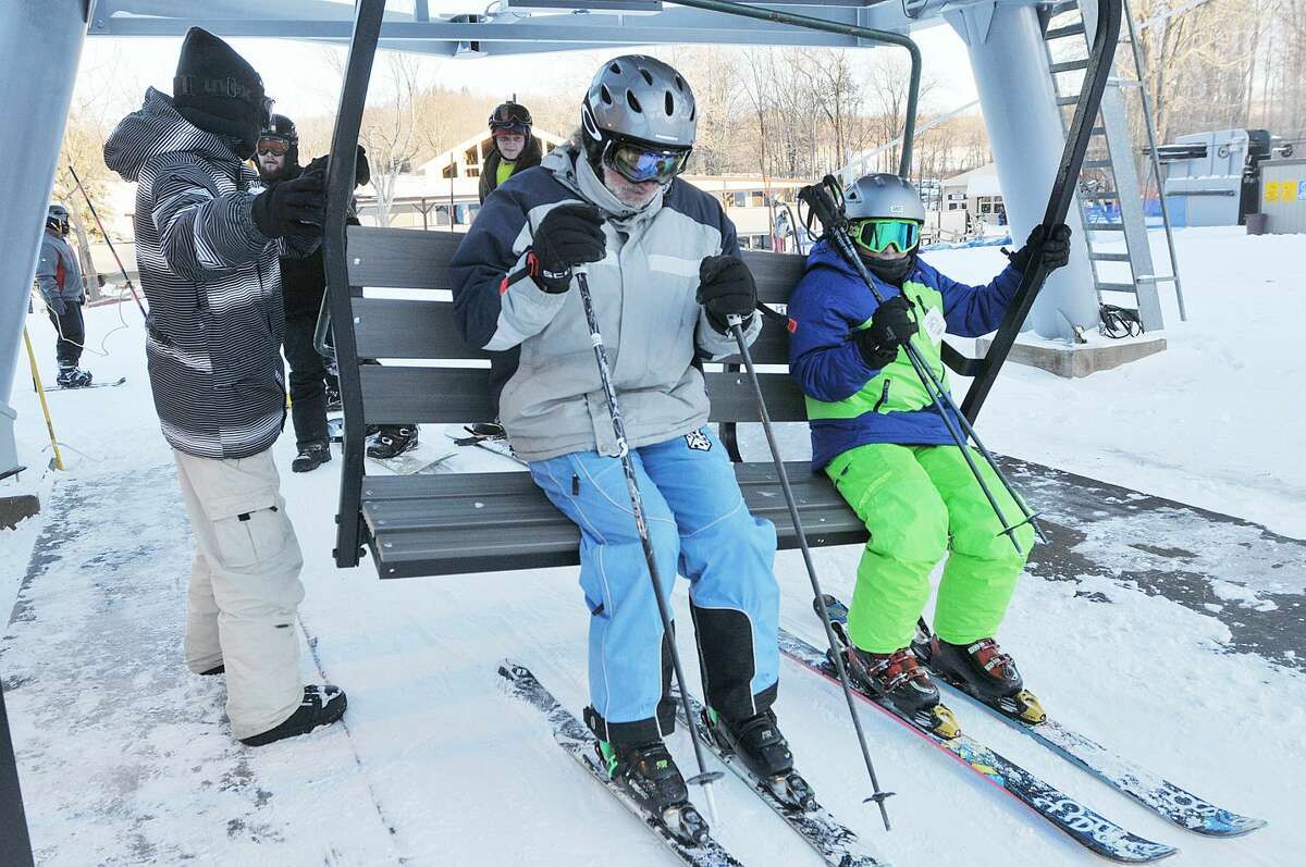 Skiers board the chair lift at Powder Ridge Mountain Park & Resort in Middlefield.