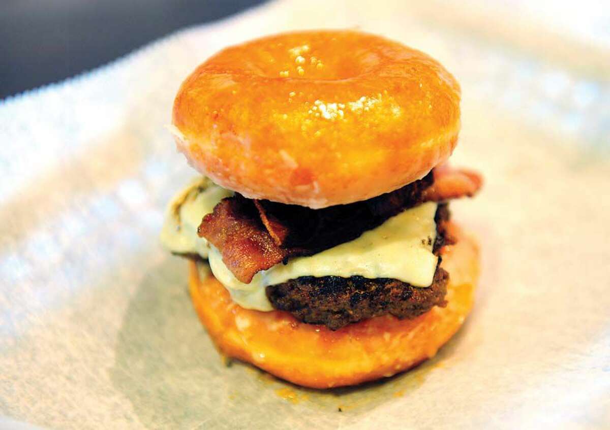 The Valley Burger (bacon atop a cheeseburger between two Krispy Kreme donuts) at The Valley Eatery on Main Street in Ansonia.