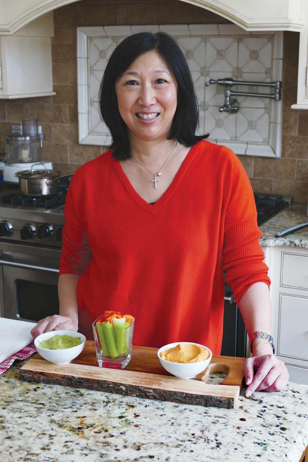 Jeanette Chen in her New Canaan kitchen.