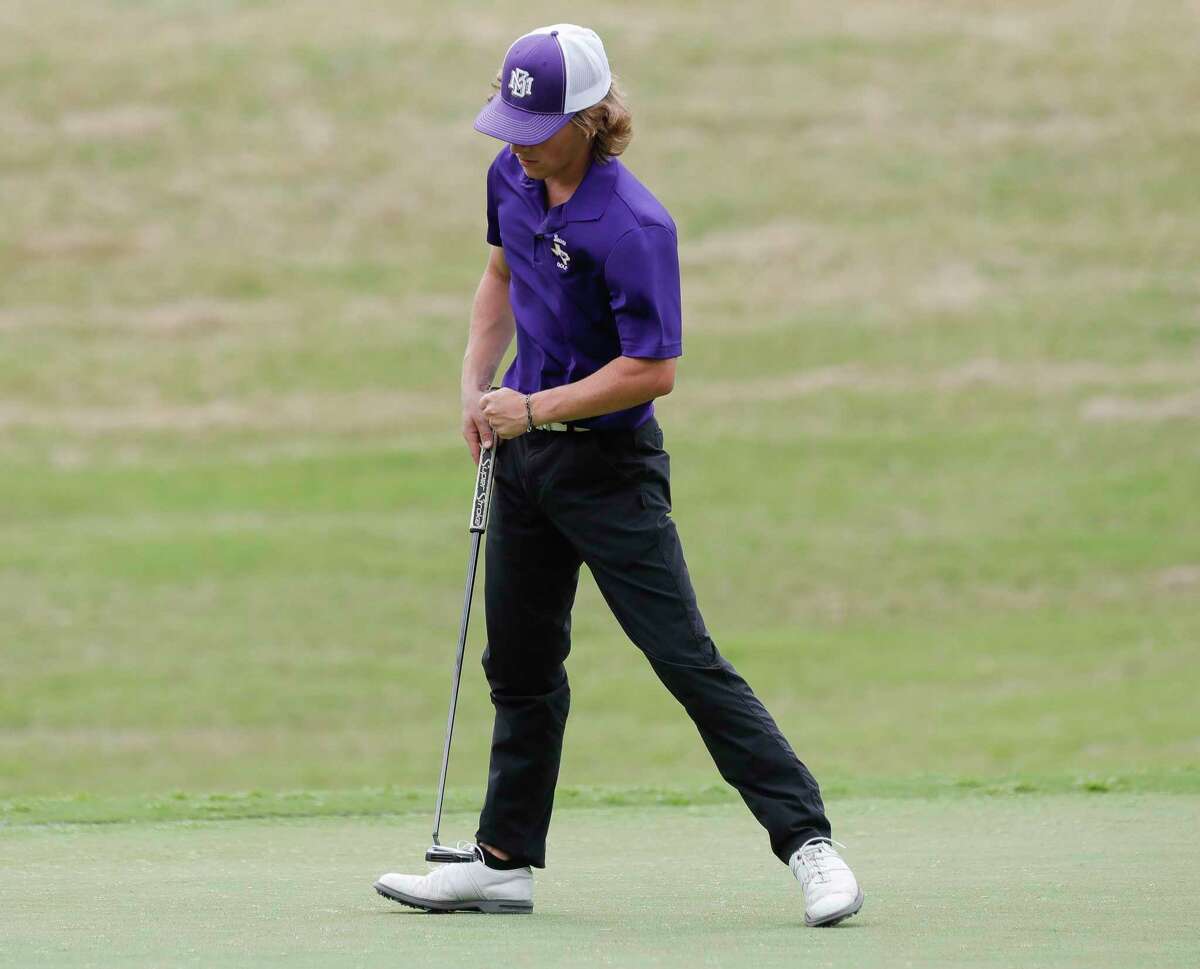 Evan Edsall of Montgomery gives a first pump after sinking a putt on the 18th green during the District 20-5A golf tournament, Tuesday, March 29, 2022, in Magnolia.