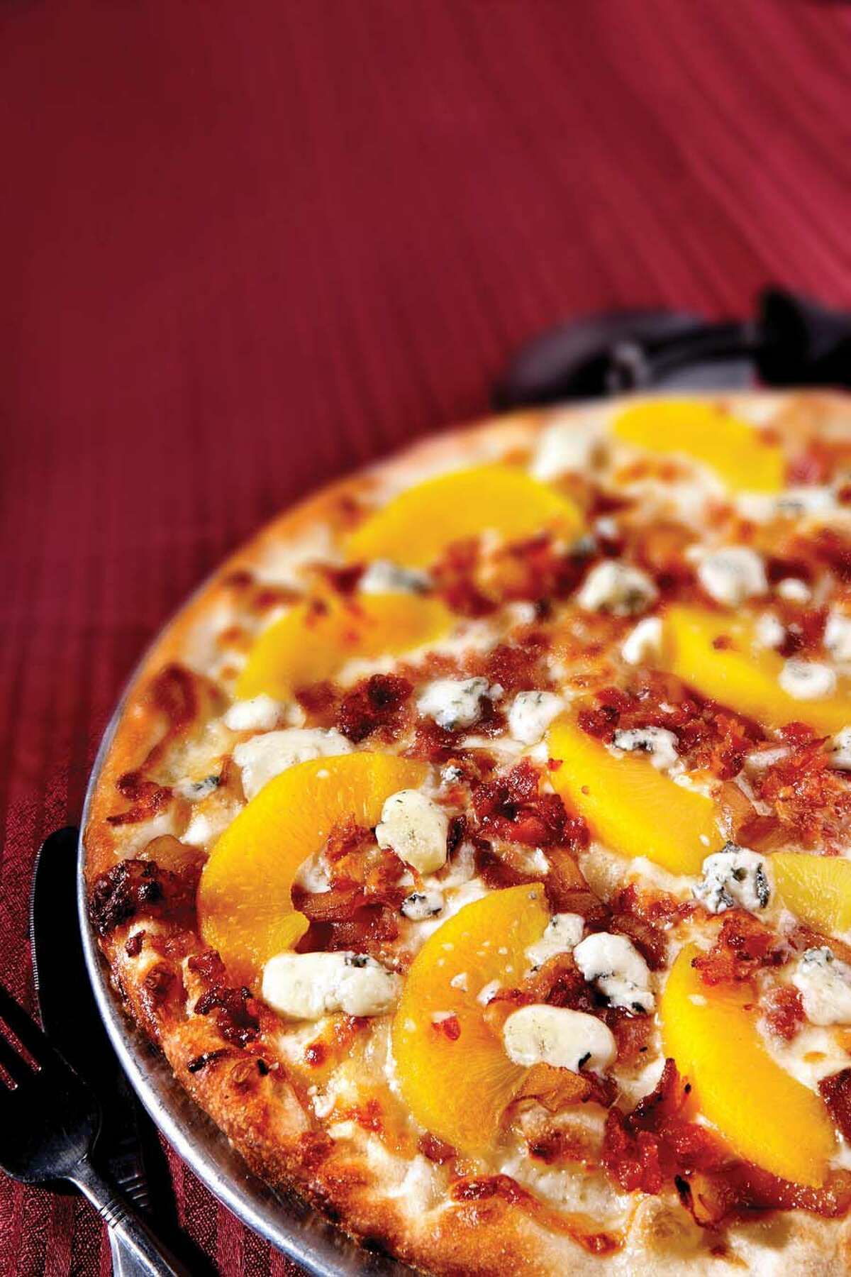 Peaches and bacon pizza