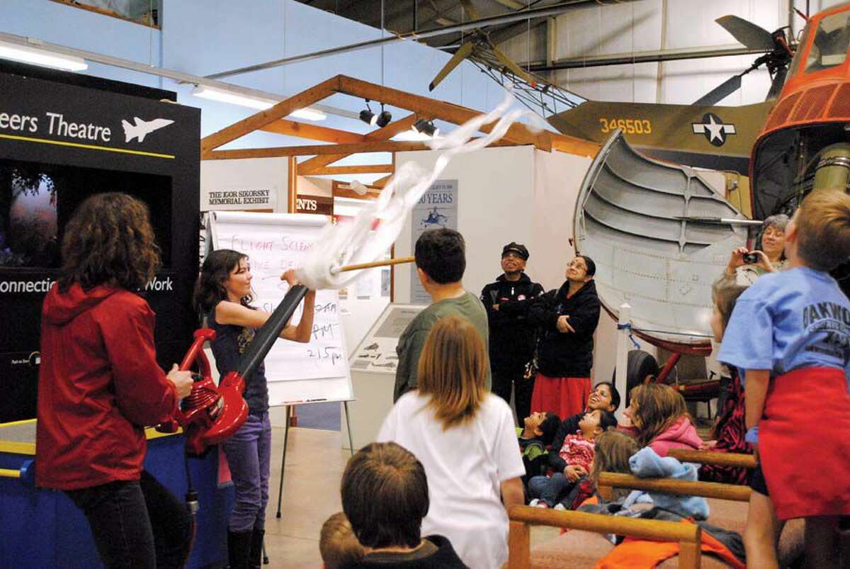 Visitors attend a science demonstration at the New England Air Museum in Windsor Locks.