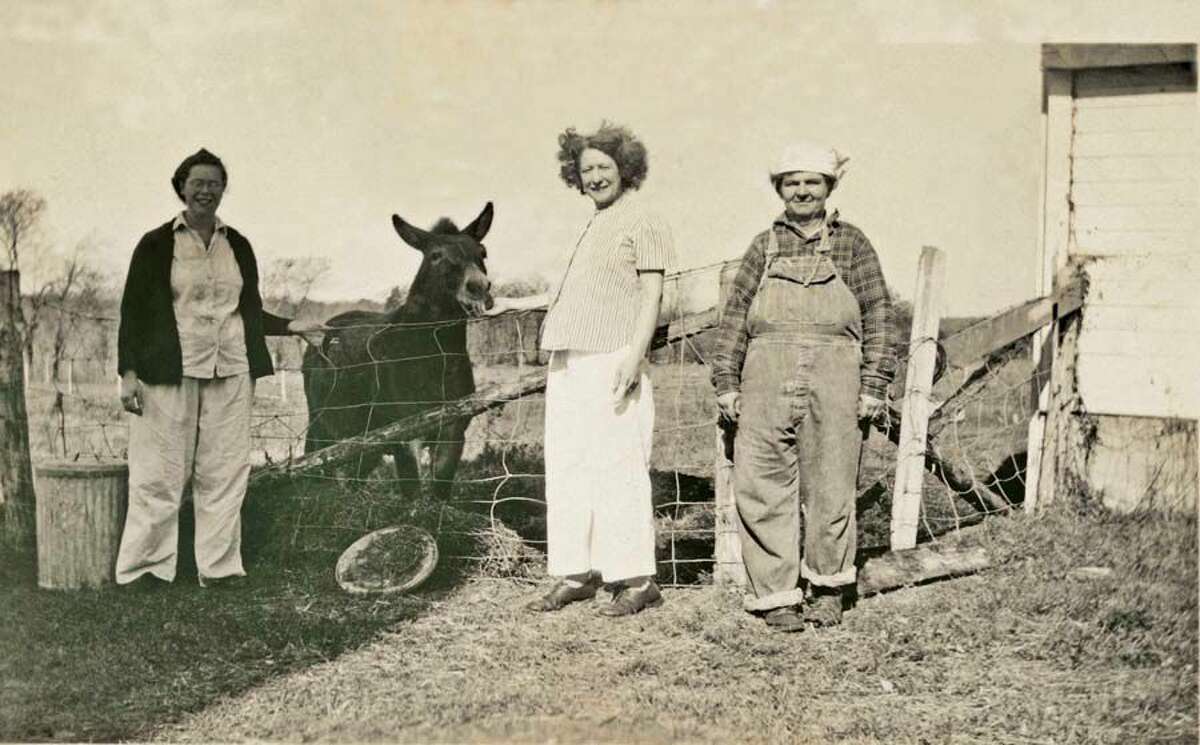 Shown here with a donkey in a circa-1920s photo, the women were very much part of a working farm. The farm was the second-largest producer of milk in Connecticut in 1941.