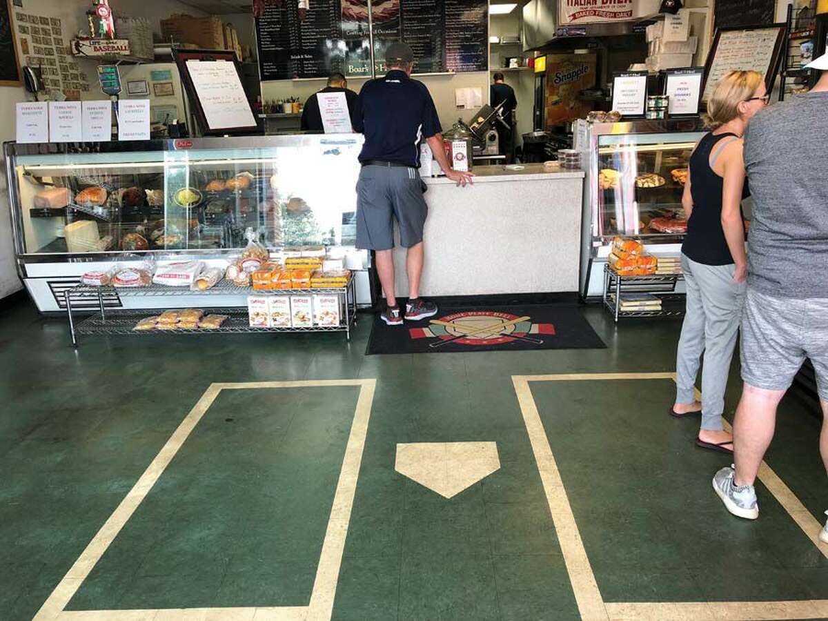 Step into the batter's box and order at Home Plate Deli in Monroe.