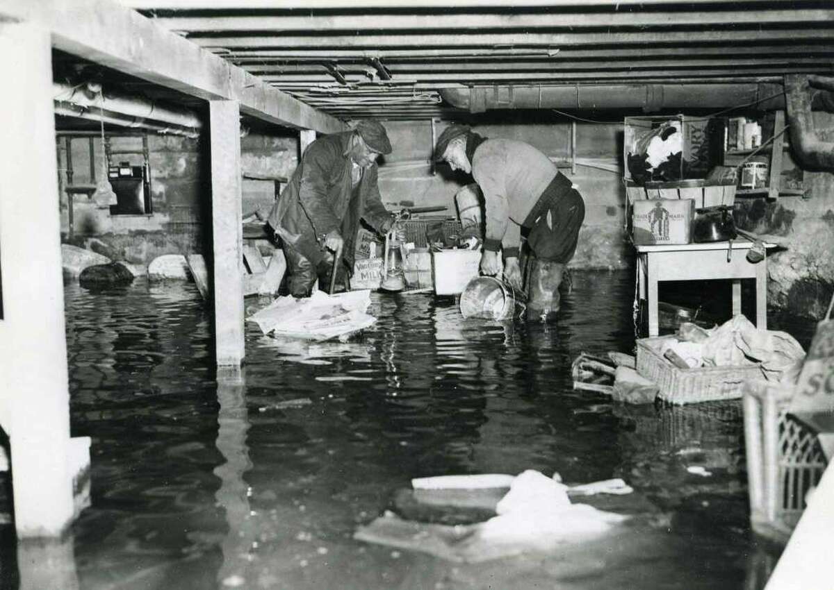 A flooded cellar in a neighborhood along the Byram River after the great hurricane of 1938 brought 80-mile-an-hour winds and a tidal wave to Greenwich shores leaving devastation in its wake.