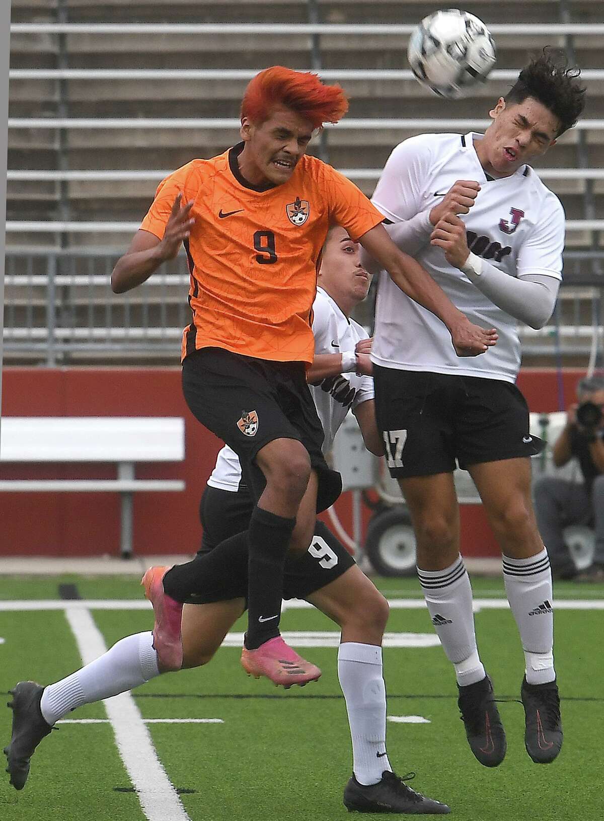 Jasper's Javier Garcia looks to get control of the ball as they battle Scarborough in the area round match-up at Beaumont Memorial Stadium. Photo made Tuesday, March 29, 2022 Kim Brent/The Enterprise
