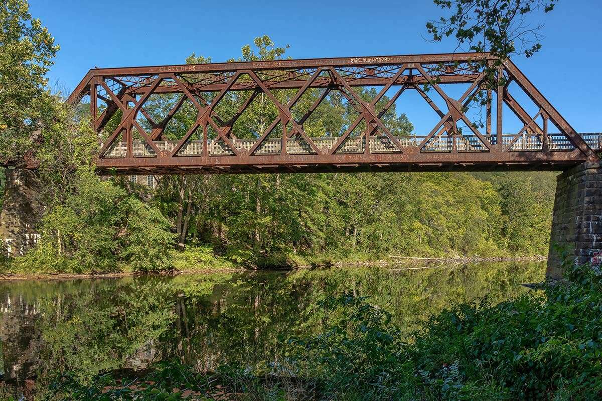 The former railroad bridge over the Farmington River is now used for recreational foot and bicycle traffic as part of the Farmington River Trail.