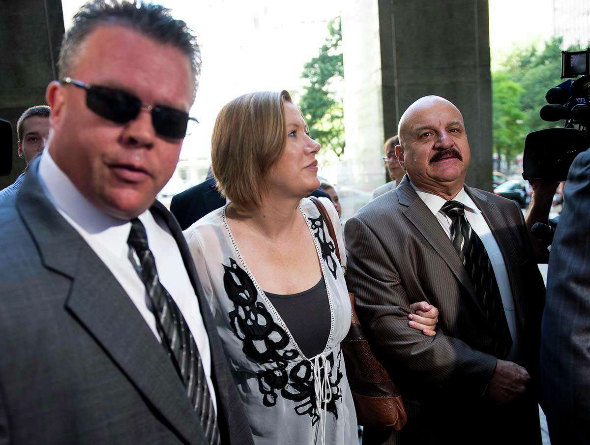 Anna Gristina, a.k.a. the “Manhattan Madam,” arrives at court with bodyguards in August 2012 in New York.