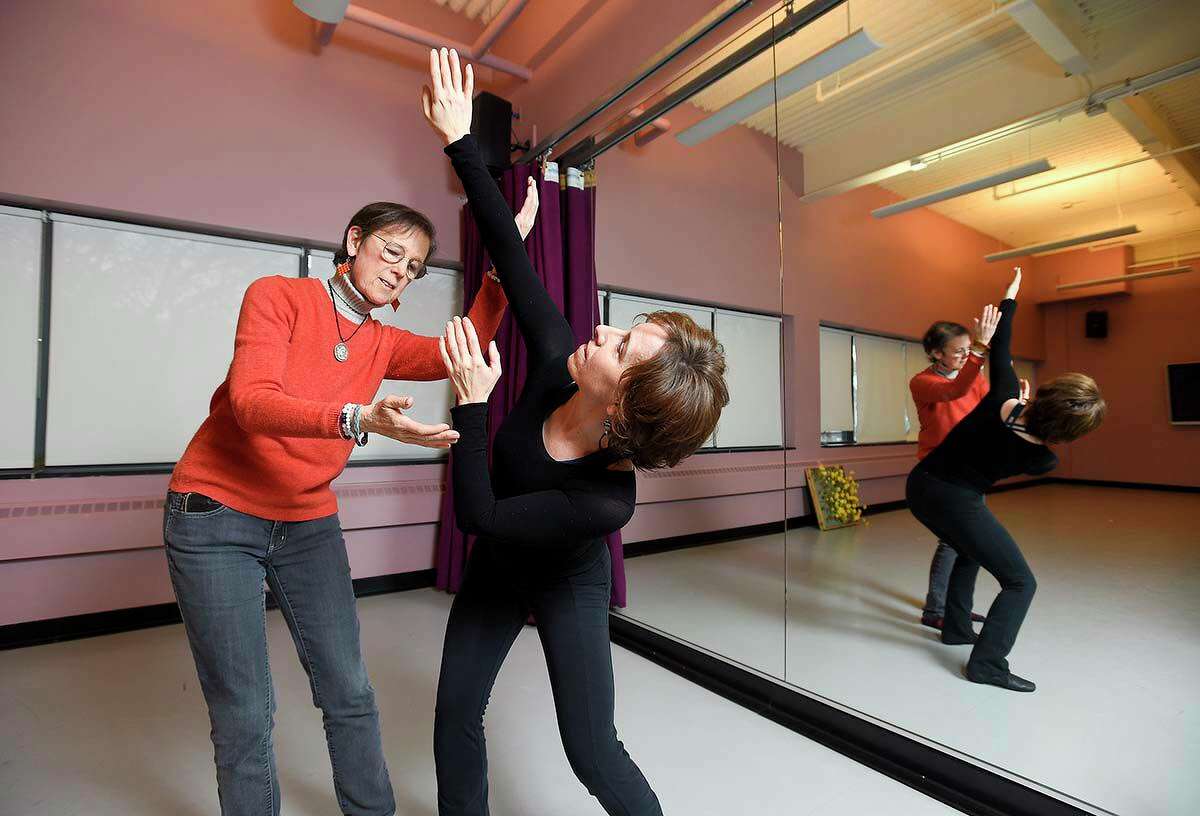 Judy Dworin (left) works with Lisa Motios, a teaching artist and founding member of the JDPP.