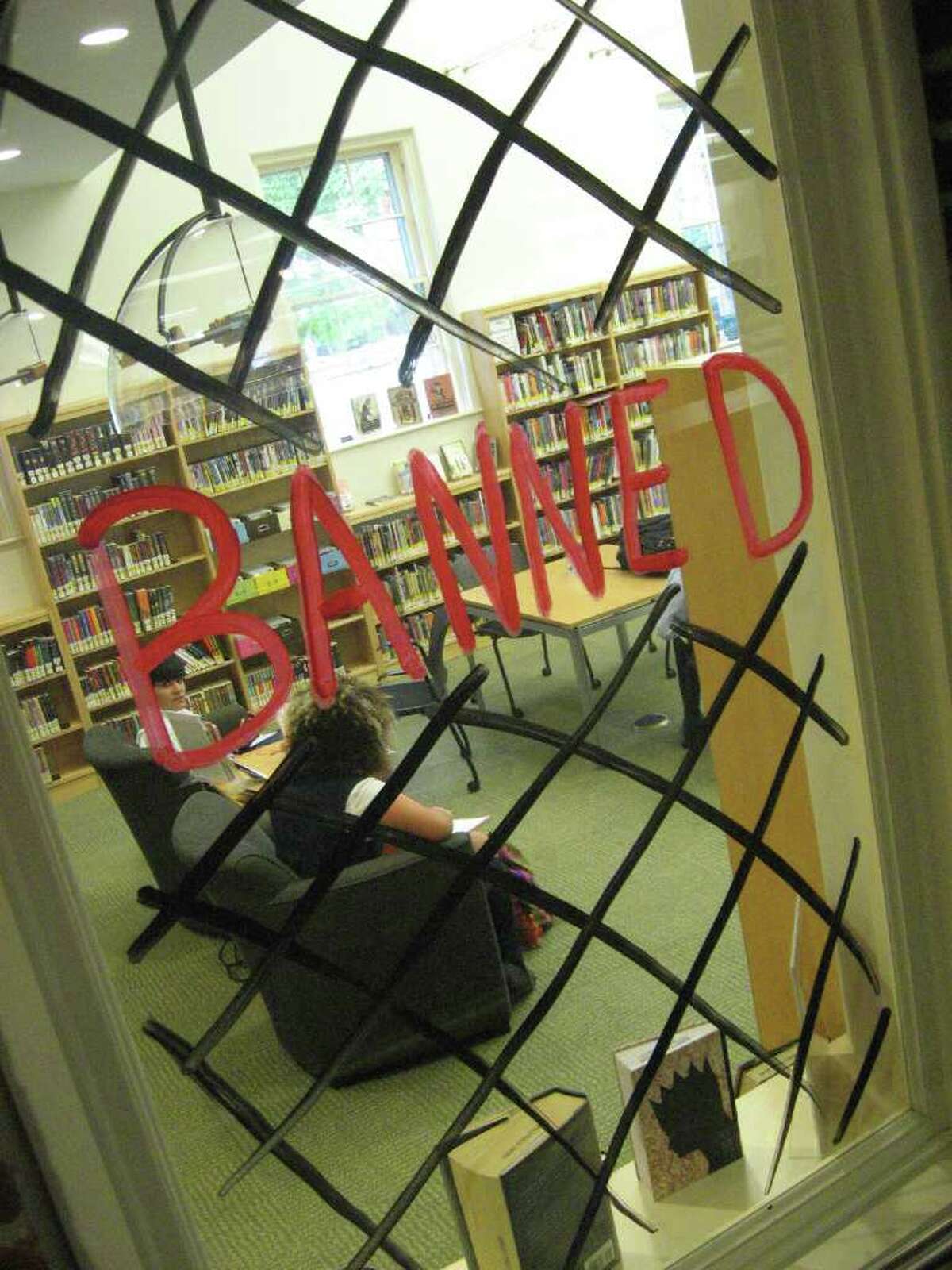 The Fairfield Public Library is currently celebrating "Banned Books Week," an annual event celebrating the freedom to read and the importance of the First Amendment. This a photo of a bookcase in the teen section of the library. The number one challenged book of the last decade, across the country, is Harry Potter, according to library staff, as many believe it promotes witchcraft and black magic, thought to be non-Christian and anti-religion.