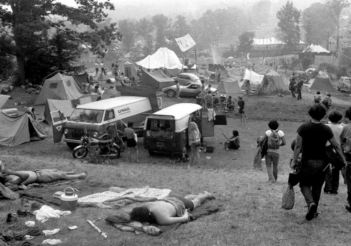 Early arrivals set up camps for a rock festival that was never to occur.