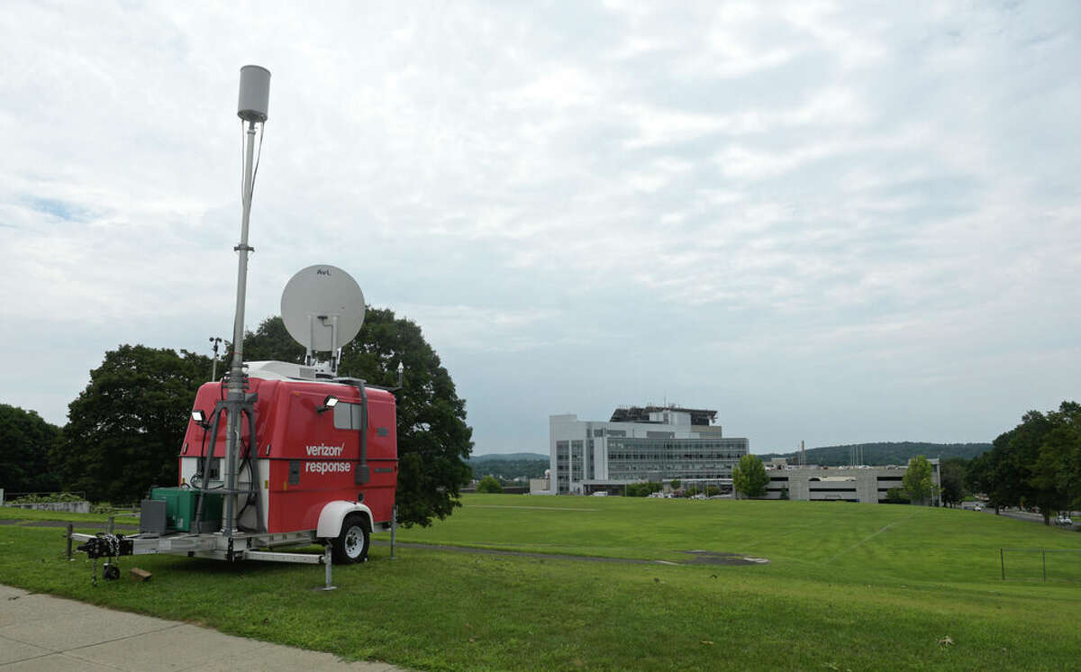 Verizon set up a mobile cell tower at Broadview Middle School in Danbury, Conn, Thursday, August 6, 2020. Danbury Hospital is in the background.