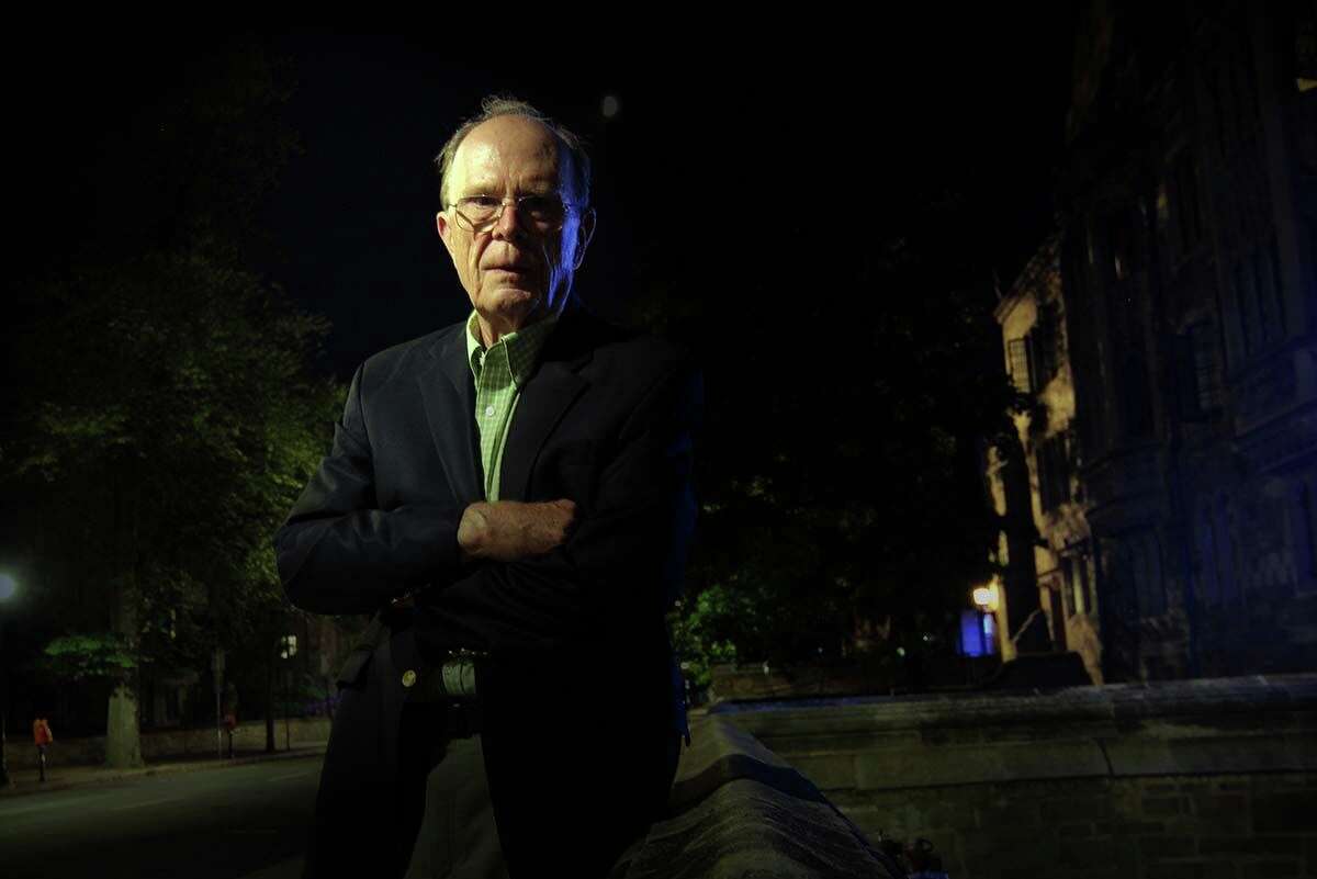 Henry Chauncey, who graduated from Yale in 1957, stands in front of the university’s Davenport College, where he lived as a student when he was approached by the CIA.