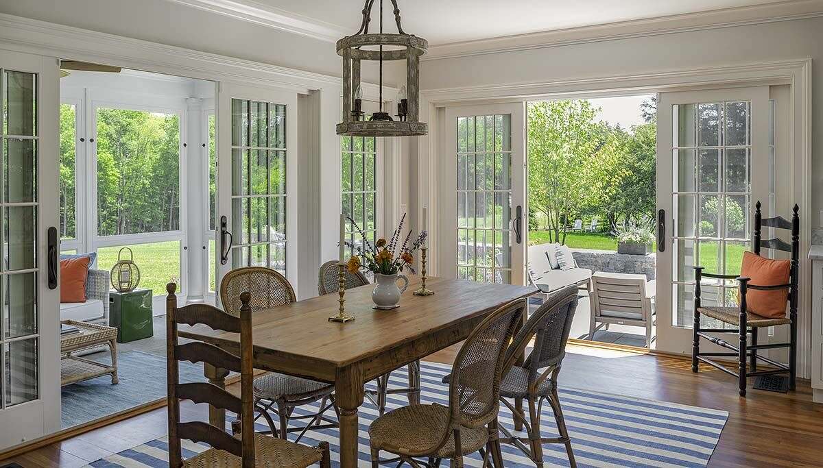 French doors open up the dining room to both the screened porch and the back patio.