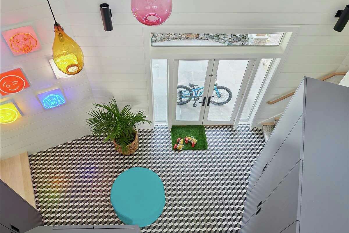 Colorful, lively and fun describe this home’s entryway. Who says a mudroom has to be boring?