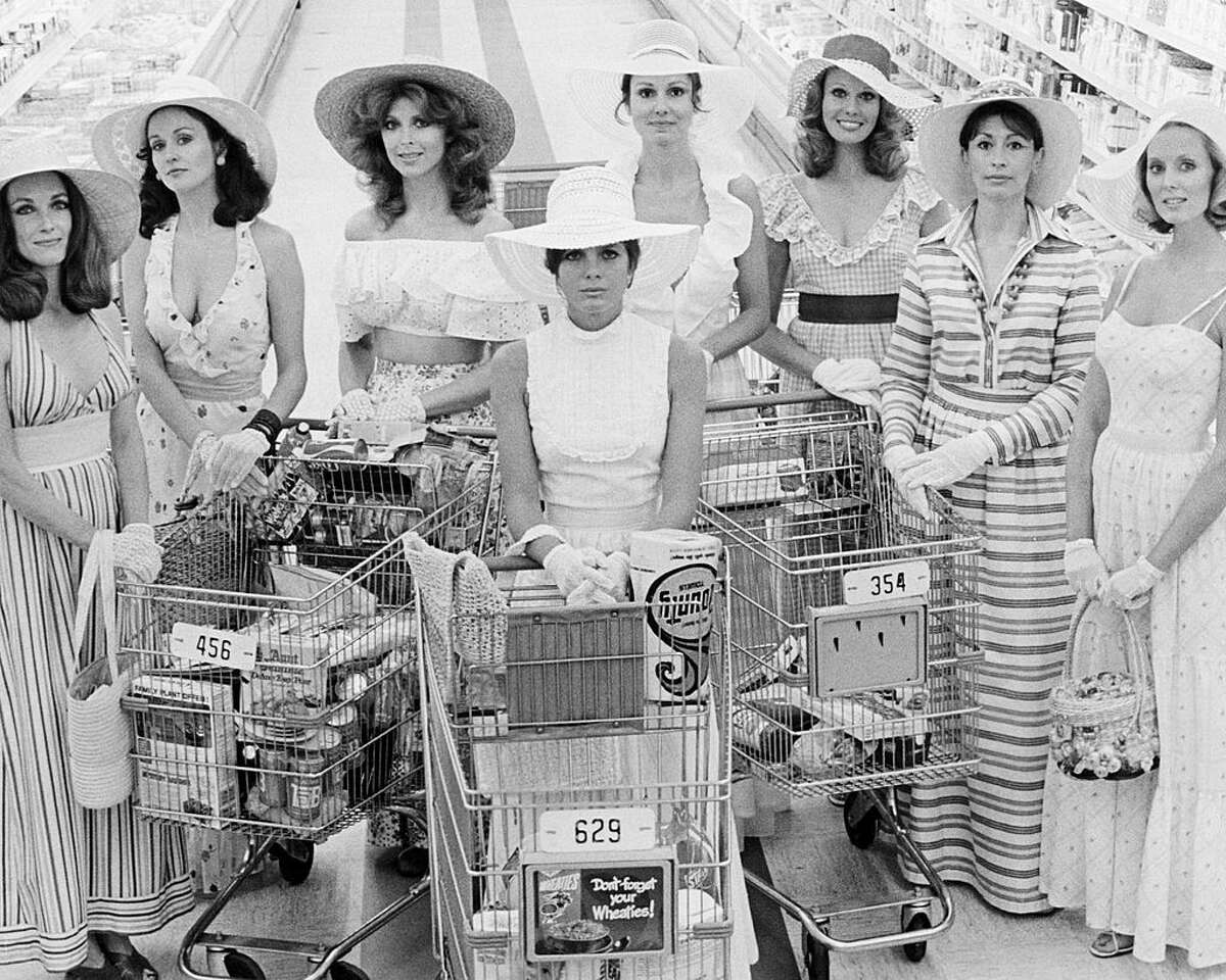 The female cast in a publicity still for 'The Stepford Wives', directed by Bryan Forbes, 1975. Left to right: Toni Reid, Carole Mallory, Tina Louise, Katharine Ross, Paula Prentiss, Barbara Rucker, Nanette Newman and Judith Baldwin.