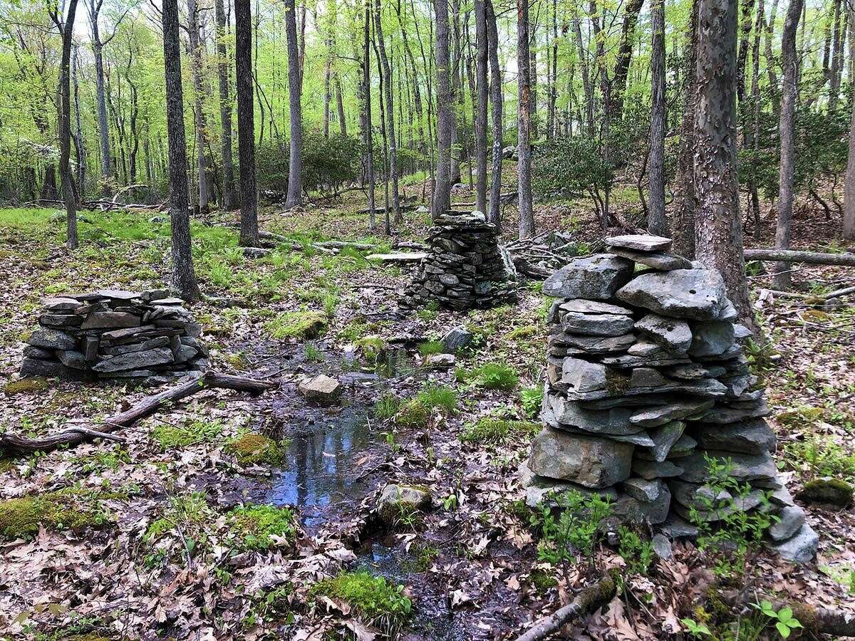 A trio of mysterious stone structures along the Ravine Trail.