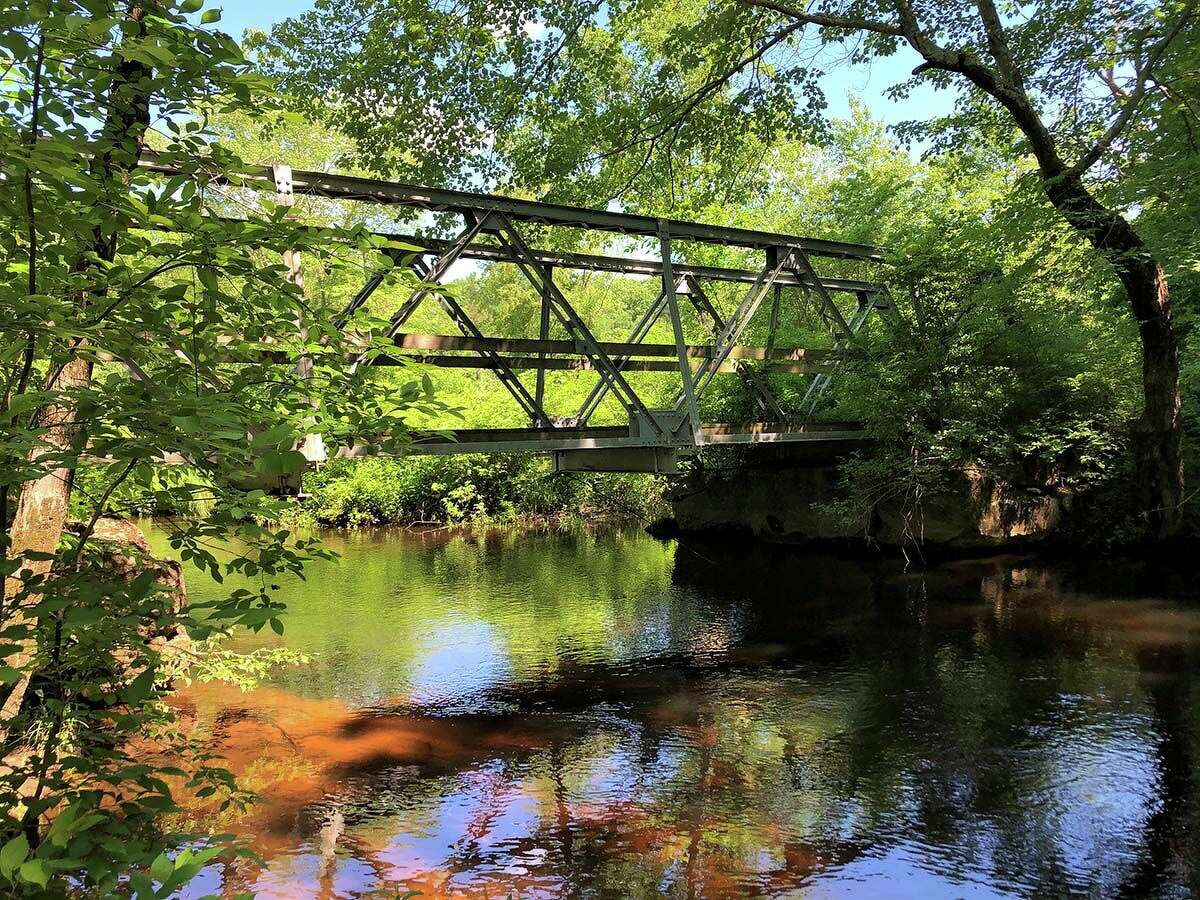 One of two Truss bridges relocated from a crossing over the Mount Hope River by the Mansfield Department of Public Works in 1999 to the Nipmuck Trail.