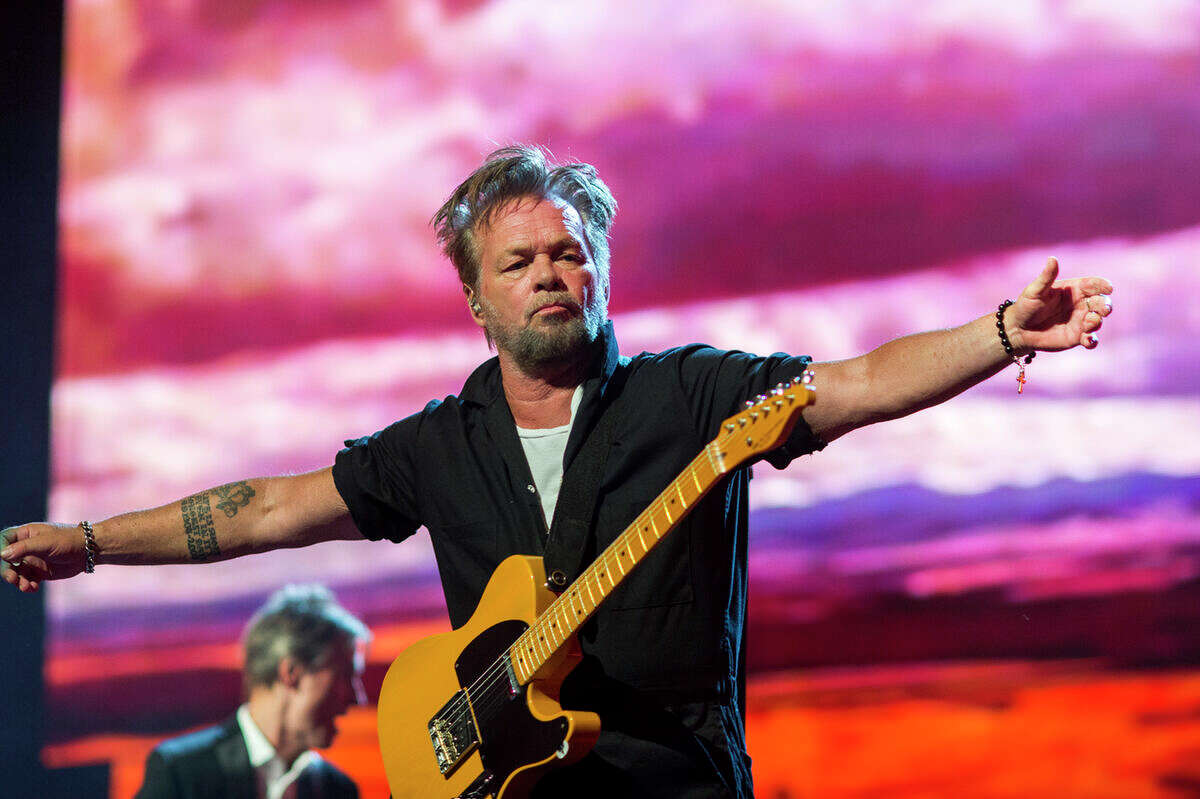 John Mellencamp performs at Farm Aid at the Xfinity Theatre in 2018.
