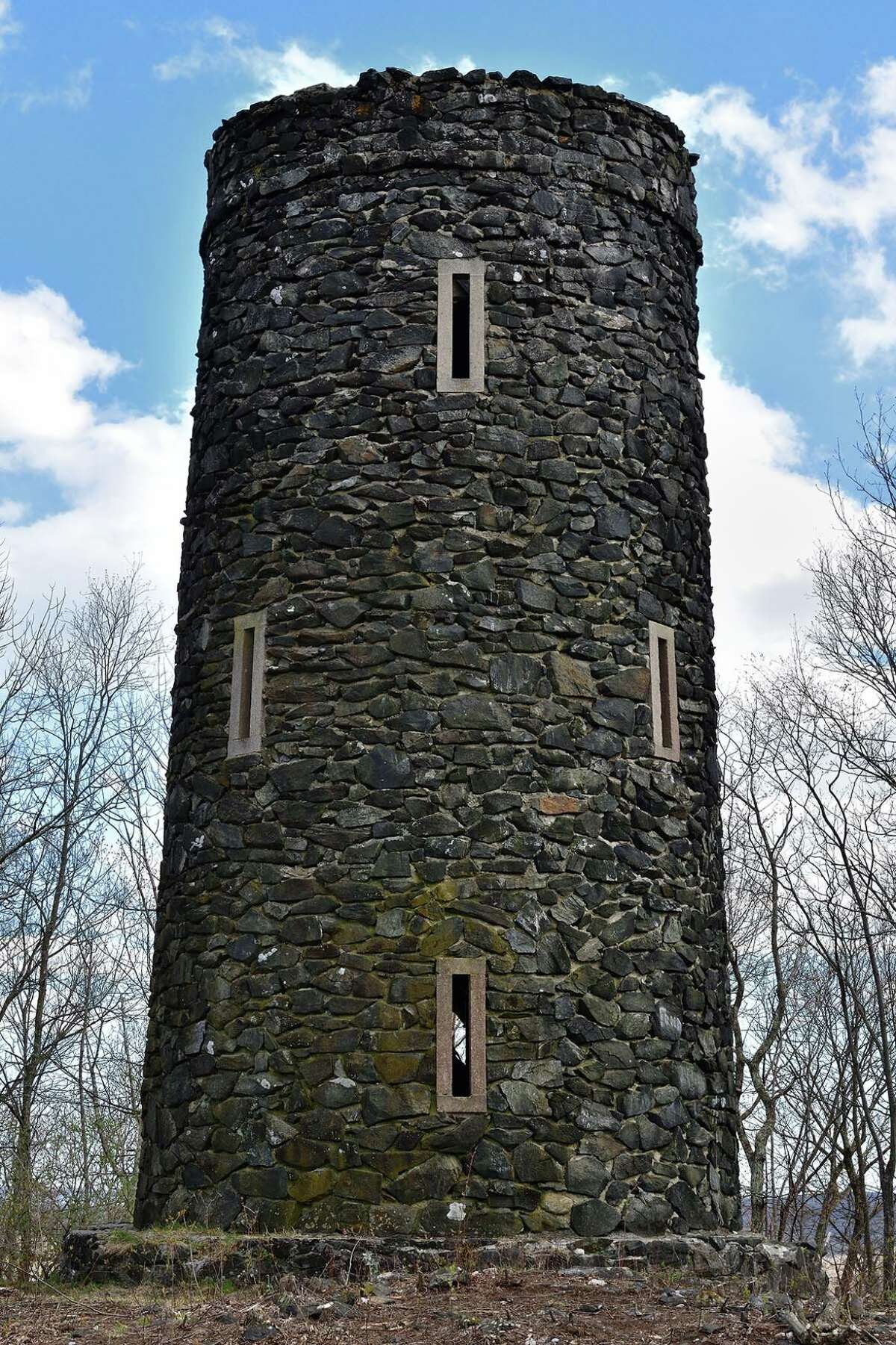 Historic stone tower at Mount Tom State Park, one of the oldest state parks in Connecticut. The tower is on the National Register of Historic Places. It is constructed mostly of gneiss, a metamorphic rock.