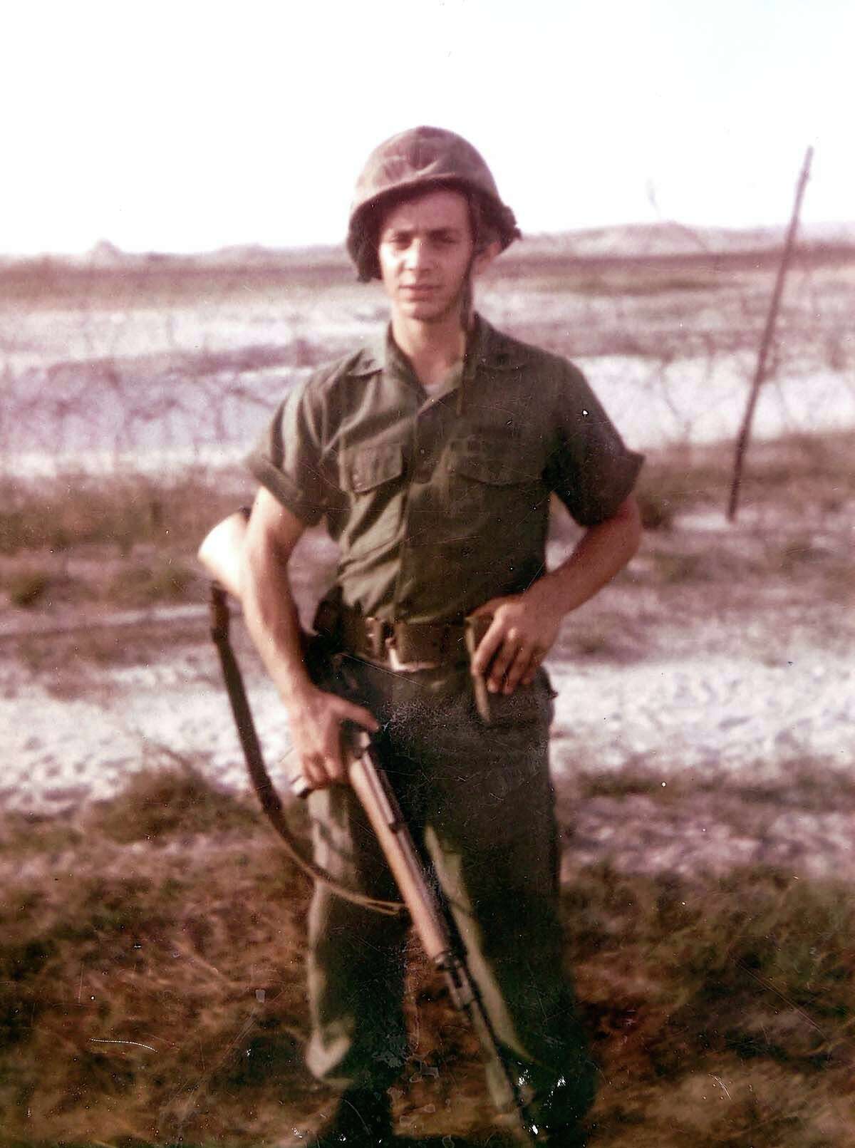 Marine Corporal Ron Farina on guard duty at Hue Phu-Bai in Vietnam in 1967.