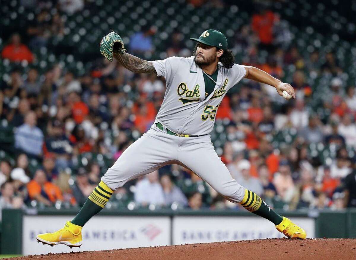 HOUSTON, TEXAS - OCTOBER 01: Sean Manaea #55 of the Oakland Athletics pitches in the first inning against the Houston Astros at Minute Maid Park on October 01, 2021 in Houston, Texas. (Photo by Bob Levey/Getty Images)
